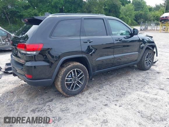 2020 Jeep Grand Cherokee Trailhawk with VIN 1C4RJFLG4LC387459, listed as a IAAI auction lot 42373820 with 55,492 mi miles and . Bid and sale history available at DreamBid. Image 4.