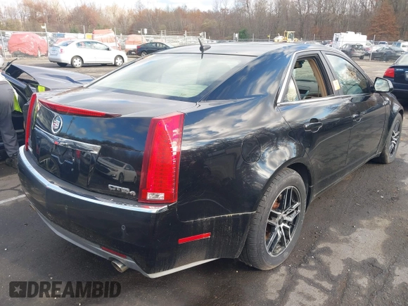2008 Cadillac CTS AWD w/1SB with VIN 1G6DT57V980206276, listed as a IAAI auction lot 40822684 with 142,690 mi miles. Bid and sale history available at carsss.com. Image 4.
