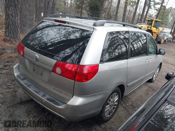 2008 Toyota Sienna XLE with VIN 5TDZK22C28S220219, listed as a IAAI auction lot 41879397 with 210,453 mi miles. Bid and sale history available at carsss.com. Image 4.