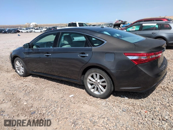 2015 Toyota Avalon Limited with VIN 4T1BK1EB9FU163116, listed as a Copart auction lot 52743545 with 151,449 mi miles and Salvage Title. Bid and sale history available at DreamBid. Image 2.