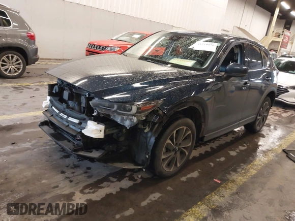 2023 Mazda CX-5 2.5 S Premium Plus Package with VIN JM3KFBEM0P0157074, listed as a IAAI auction lot 41215076 with 37,323 mi miles. Bid and sale history available at carsss.com. Image 2.