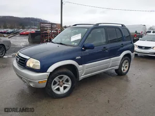 2003 Suzuki Grand Vitara with VIN JS3TD62V134105917, listed as a IAAI auction lot 41415963 with 87,548 mi miles. Bid and sale history available at carsss.com. Image 2.