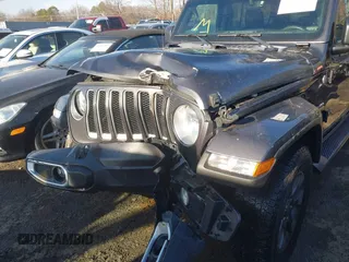 2018 Jeep Wrangler Unlimited Sahara with VIN 1C4HJXEN5JW203879, listed as a IAAI auction lot 41131467 with 87,065 mi miles and . Bid and sale history available at DreamBid. Image 6.