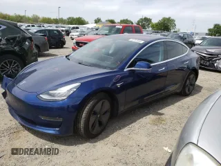 2018 Tesla Model 3 Long Range Battery with VIN 5YJ3E1EB3JF093680, listed as a Copart auction lot 52757865 with 60,598 mi miles and Salvage Title. Bid and sale history available at DreamBid. Image 1.