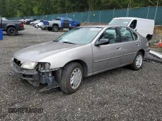 1999 Nissan Altima XE z VIN 1N4DL01D7XC148803, wystawiony jako Copart lot #57185365 z przebiegiem 222 556 mil mil oraz Szkoda całkowita • Salvage title. Historia ofert i sprzedaży dostępna na DreamBid. Obrazek 1.