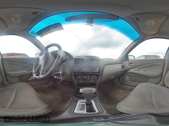 2004 Nissan Sentra S z VIN 3N1CB51D44L920389, wystawiony jako Copart lot #54788315 z przebiegiem 178 674 mil mil oraz Szkoda całkowita • Salvage title. Historia ofert i sprzedaży dostępna na DreamBid. Obrazek 14.