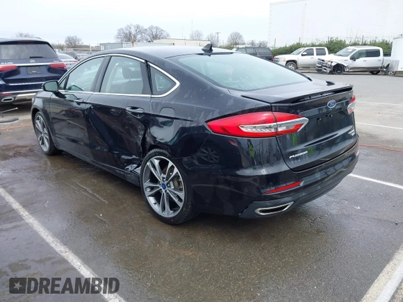 2019 Ford Fusion Titanium with VIN 3FA6P0K93KR243148, listed as a IAAI auction lot 41757469 with 78,859 mi miles. Bid and sale history available at carsss.com. Image 3.
