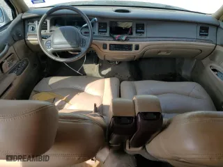 1997 Lincoln Town Car Signature with VIN 1LNLM82W9VY681894, listed as a Copart auction lot 71467034 with 129,142 mi miles and Salvage Title. Bid and sale history available at carsss.com. Image 8.