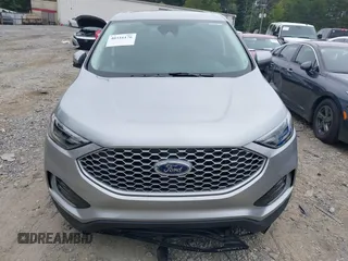 2024 Ford Edge SEL z VIN 2FMPK4J94RBA67639, wystawiony jako IAAI lot #40316176 z przebiegiem 5319 mil mil oraz . Historia ofert i sprzedaży dostępna na DreamBid. Obrazek 12.