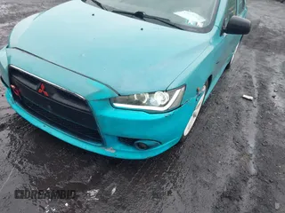 2013 Mitsubishi Lancer GT with VIN JA32U8FW6DU022878, listed as a IAAI auction lot 42449708 with 121,869 mi miles and . Bid and sale history available at DreamBid. Image 6.