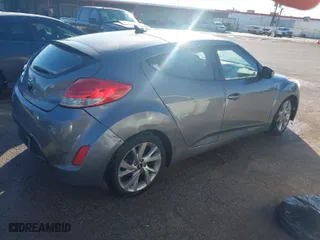 2012 Hyundai Veloster w/Gray Int with VIN KMHTC6AD8CU027710, listed as a IAAI auction lot 41758972 with 126,490 mi miles. Bid and sale history available at carsss.com. Image 4.