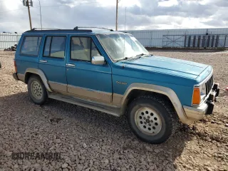 1993 Jeep Cherokee Country with VIN 1J4FJ78S8PL504126, listed as a Copart auction lot 46651035 with 153,170 mi miles and Clean Title. Bid and sale history available at carsss.com. Image 4.