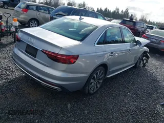 2020 Audi A4 Premium z VIN WAUGMAF45LA067448, wystawiony jako IAAI lot #41712095 z przebiegiem 66 321 mil mil oraz . Historia ofert i sprzedaży dostępna na DreamBid. Obrazek 4.