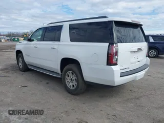 2015 GMC Yukon XL SLT with VIN 1GKS1HKC7FR126375, listed as a IAAI auction lot 41689017 with 218,622 mi miles. Bid and sale history available at carsss.com. Image 3.