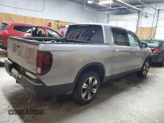 2017 Honda Ridgeline RTL-E with VIN 5FPYK3F71HB030020, listed as a Copart auction lot 82834683 with 102,111 mi miles and Salvage title. Bid and sale history available at DreamBid. Image 3.