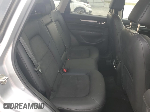 2021 Mazda CX-5 Touring with VIN JM3KFACM2M0451083, listed as a Copart auction lot 49999935 with 59,927 mi miles and Salvage Title. Bid and sale history available at carsss.com. Image 11.