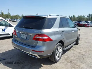 2014 Mercedes-Benz M 350 with VIN 4JGDA5HB4EA371774, listed as a IAAI auction lot 42079843 with 128,448 mi miles and . Bid and sale history available at DreamBid. Image 4.