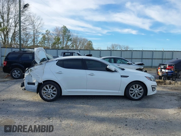 2015 Kia Optima EX with VIN 5XXGN4A77FG437245, listed as a IAAI auction lot 41560539 with 196,480 mi miles and . Bid and sale history available at DreamBid. Image 14.