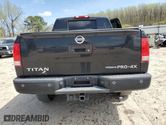 2015 Nissan Titan Pro-4X with VIN 1N6BA0EC1FN507491, listed as a Copart auction lot 51240915 with 165,510 mi miles and Salvage title. Bid and sale history available at DreamBid. Image 6.