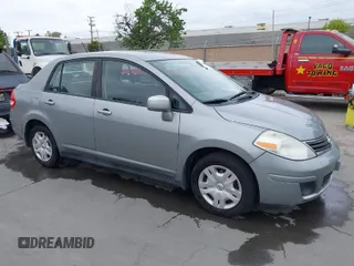2011 Nissan Versa 1.8 S with VIN 3N1BC1AP0BL461824, listed as a IAAI auction lot 42076994 with 180,798 mi miles. Bid and sale history available at carsss.com. Image 1.