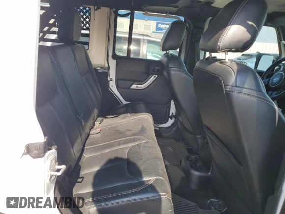 2015 Jeep Wrangler Unlimited Rubicon with VIN 1C4BJWFG1FL750561, listed as a Copart auction lot 60797075 with 95,677 mi miles and Salvage title. Bid and sale history available at DreamBid. Image 10.