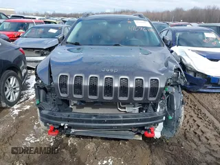2017 Jeep Cherokee Trailhawk z VIN 1C4PJMBS0HW649422, wystawiony jako IAAI lot #41696815 z przebiegiem 62 185 mil mil oraz . Historia ofert i sprzedaży dostępna na DreamBid. Obrazek 13.