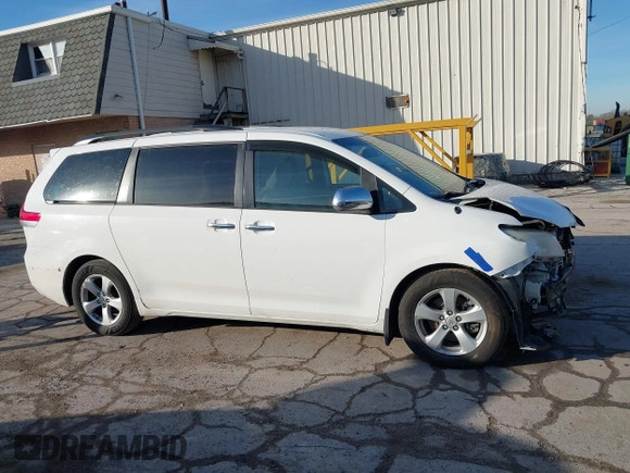 2014 Toyota Sienna LE AAS with VIN 5TDKK3DC2ES483679, listed as a IAAI auction lot 41547261 with 142,697 mi miles. Bid and sale history available at carsss.com. Image 14.
