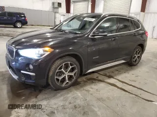 2018 BMW X1 xDrive28i with VIN WBXHT3C31J5K22443, listed as a Copart auction lot 60968005 with 116,425 mi miles and Salvage title. Bid and sale history available at DreamBid. Image 1.