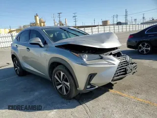 2021 Lexus NX 300 with VIN JTJGARBZ7M2191564, listed as a Copart auction lot 57974155 with 52,499 mi miles and Salvage title. Bid and sale history available at DreamBid. Image 14.