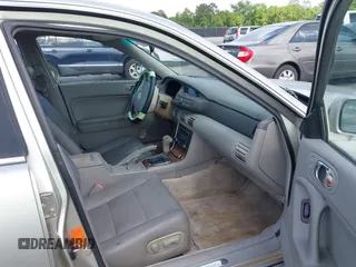 2002 Mazda Millenia with VIN JM1TA221721722364, listed as a IAAI auction lot 42160683 with 166,778 mi miles and . Bid and sale history available at DreamBid. Image 5.
