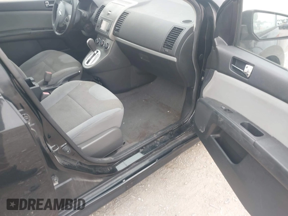 2012 Nissan Sentra 2.0 z VIN 3N1AB6AP3CL664042, wystawiony jako IAAI lot #42635693 z przebiegiem 142 127 mil mil oraz . Historia ofert i sprzedaży dostępna na DreamBid. Obrazek 5.