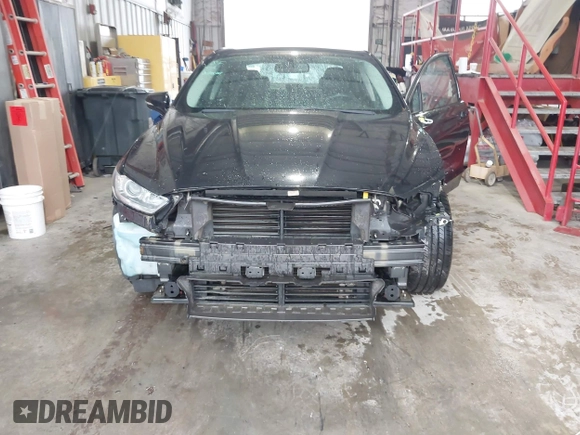2013 Ford Fusion Titanium Hybrid with VIN 3FA6P0RU4DR281789, listed as a IAAI auction lot 41909115 with 161,008 mi miles and . Bid and sale history available at DreamBid. Image 6.