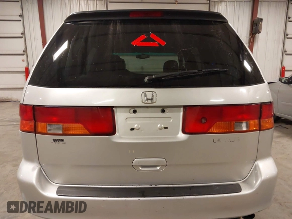 2004 Honda Odyssey EX-L with VIN 5FNRL18974B127696, listed as a IAAI auction lot 41643243 with 200,286 mi miles and . Bid and sale history available at DreamBid. Image 17.