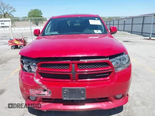2013 Dodge Durango R/T with VIN 1C4SDJCTXDC697240, listed as a IAAI auction lot 42209558 with 130,735 mi miles and . Bid and sale history available at DreamBid. Image 12.