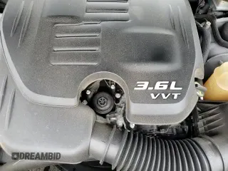 2021 Dodge Challenger SXT z VIN 2C3CDZGG7MH539410, wystawiony jako Copart lot #65205685 z przebiegiem 34 806 mil mil oraz Szkoda całkowita • Salvage title. Historia ofert i sprzedaży dostępna na DreamBid. Obrazek 15.