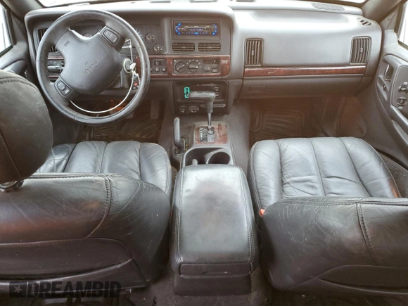 1998 Jeep Grand Cherokee Limited with VIN 1J4GZ88Z4WC164505, listed as a Copart auction lot 76843304 with 0 mi miles and Salvage Title. Bid and sale history available at carsss.com. Image 8.