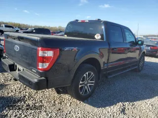 2023 Ford F-150 XL with VIN 1FTEW1CP9PKD57520, listed as a Copart auction lot 50247595 with 39,477 mi miles and Salvage Title. Bid and sale history available at carsss.com. Image 3.