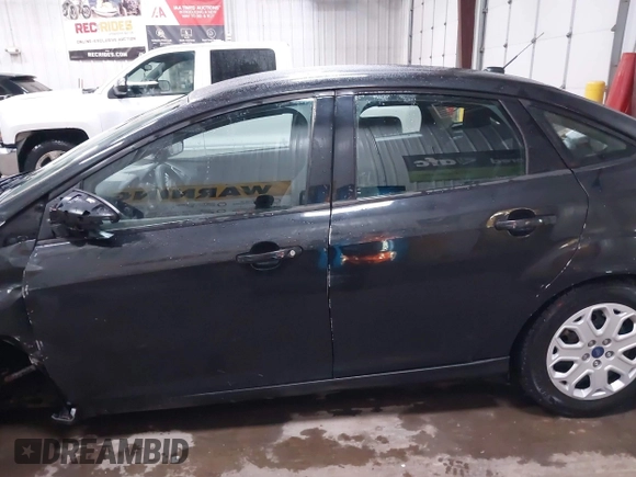 2012 Ford Focus SE с VIN 1FAHP3F22CL394151, выставлен на аукционе IAAI как лот 42146644 с пробегом 79 433 миль миль и . История ставок и продаж доступна на DreamBid. Изображение 15.