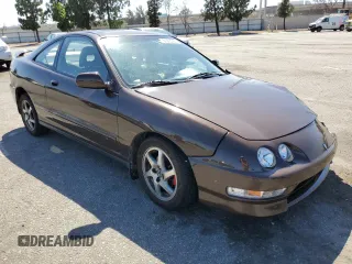 2000 Acura Integra LS with VIN JH4DC4453YS014754, listed as a Copart auction lot 61295265 with 135,573 mi miles and Salvage title. Bid and sale history available at DreamBid. Image 4.