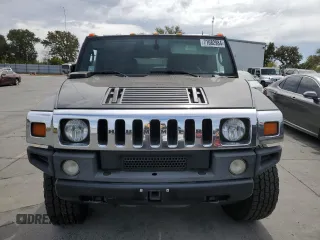 2005 Hummer H2 SUV with VIN 5GRGN23UX5H115383, listed as a Copart auction lot 71682984 with 157,405 mi miles and Salvage Title. Bid and sale history available at carsss.com. Image 5.