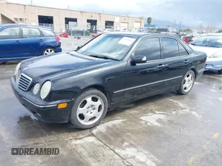 2000 Mercedes-Benz E-Class with VIN WDBJF65JXYA997410, listed as a IAAI auction lot 41939485 with 158,559 mi miles. Bid and sale history available at carsss.com. Image 19.