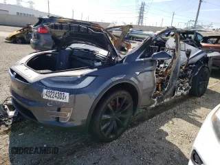 2021 Tesla Model X P90D with VIN 5YJXCAE4XMF322630, listed as a Copart auction lot 43224303 with 0 mi miles. Bid and sale history available at carsss.com. Image 1.