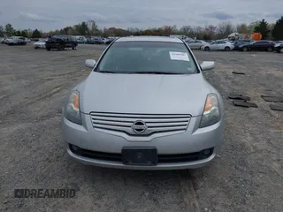 2009 Nissan Altima S with VIN 1N4AL21E69C139021, listed as a IAAI auction lot 41909983 with 181,545 mi miles and . Bid and sale history available at DreamBid. Image 12.