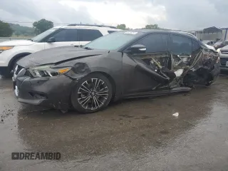 2016 Nissan Maxima Platinum with VIN 1N4AA6AP2GC409549, listed as a Copart auction lot 64416814 with 131,330 mi miles and Salvage title. Bid and sale history available at DreamBid. Image 1.