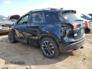 2016 Mazda CX-5 Grand Touring with VIN JM3KE4DY8G0719113, listed as a Copart auction lot 52160285 with 259,365 mi miles and Salvage Title. Bid and sale history available at carsss.com. Image 2.