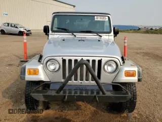 2003 Jeep Wrangler Sport z VIN 1J4FA49S93P306817, wystawiony jako Copart lot #60136385 z przebiegiem 217 208 mil mil oraz Czysty tytuł • Clean title. Historia ofert i sprzedaży dostępna na DreamBid. Obrazek 5.