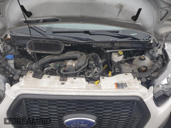 2021 Ford Transit Cargo with VIN 1FTBR1X84MKA38597, listed as a Copart auction lot 71813334 with 141,505 mi miles and Clean Title. Bid and sale history available at DreamBid. Image 12.