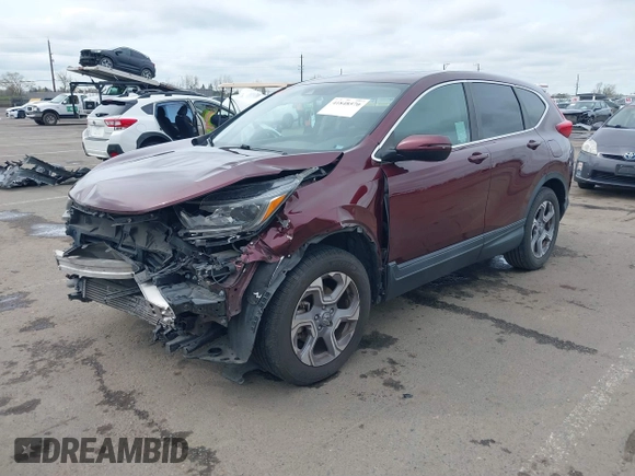 2019 Honda CR-V EX with VIN 7FARW2H56KE053022, listed as a IAAI auction lot 41848570 with 128,676 mi miles. Bid and sale history available at carsss.com. Image 18.