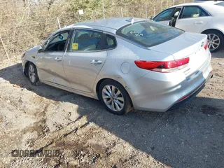 2016 Kia Optima LX with VIN 5XXGT4L35GG059931, listed as a IAAI auction lot 40995180 with 130,596 mi miles. Bid and sale history available at carsss.com. Image 3.
