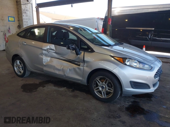 2018 Ford Fiesta SE with VIN 3FADP4BJXJM138126, listed as a IAAI auction lot 42006057 with 188,156 mi miles. Bid and sale history available at carsss.com. Image 1.